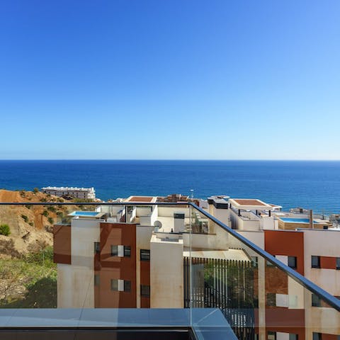 Take in calming views of the Mediterranean Sea from the terrace 