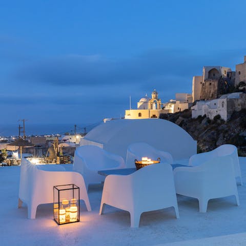 Bask in moonglow on the rooftop seating and look out to sea