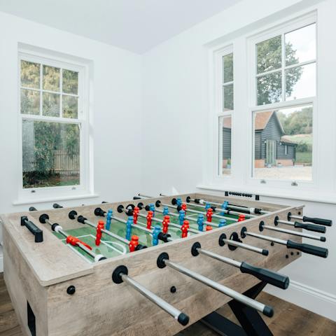 Get competitive with an evening game of table football