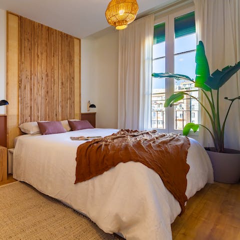 Wake up in the tropical-inspired bedroom feeling rested and ready for another day of Barcelona sightseeing