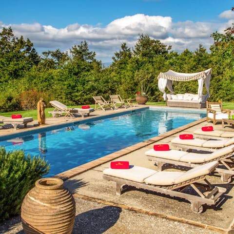 Soak up the magic of the garden while lounging by the pool