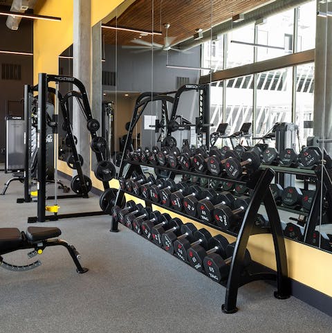 Break a sweat with a workout in the communal fitness centre