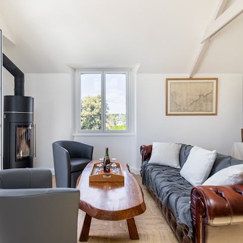 Get cosy in the living room in front of the wood burning stove in the evening after a busy day