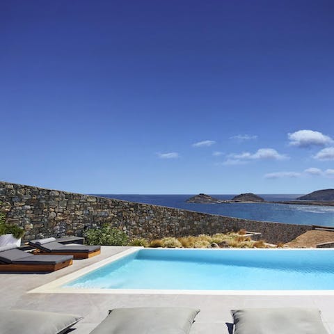 Take in the stunning views while lounging poolside
