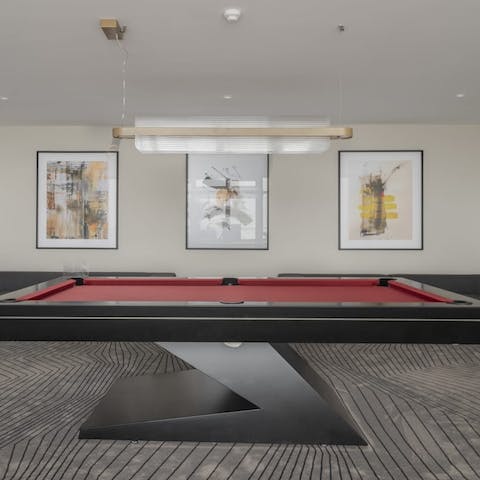 Challenge your partner to a pool competition in the shared games room