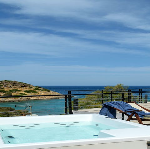 Relax in the private Jacuzzi while admiring the ocean vistas