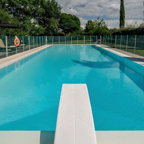 Dive into the swimming pool to beat the Italian heat