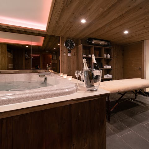 Luxuriate in the hot bubbles of the Jacuzzi in the private spa