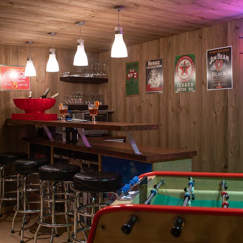 Pour drinks and play games in the kitted-out recreation room