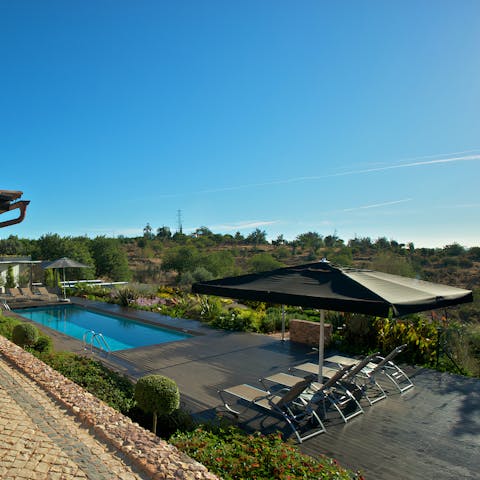 Spend well-deserved lazy days relaxing by the pool