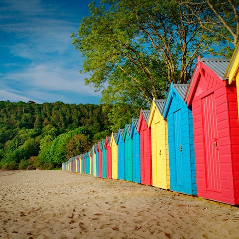 Sink your feet into the sand at nearby Llanbedrog beach