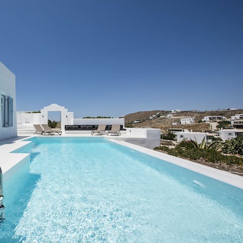 Cool off from the Greek heat with a refreshing dip in the private pool