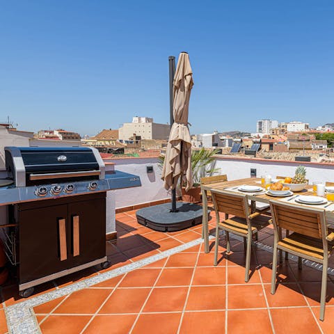 Barbecue tapas and dine alfresco with a view over the rooftops
