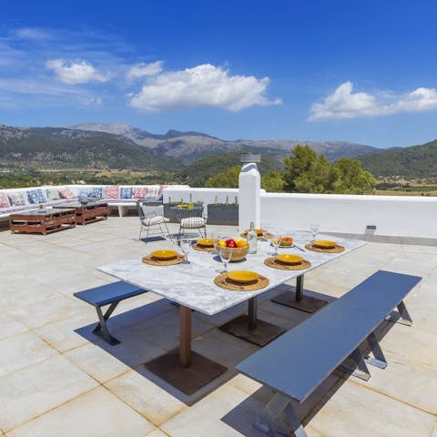 Enjoy mountain views while dining alfresco on the roof terrace