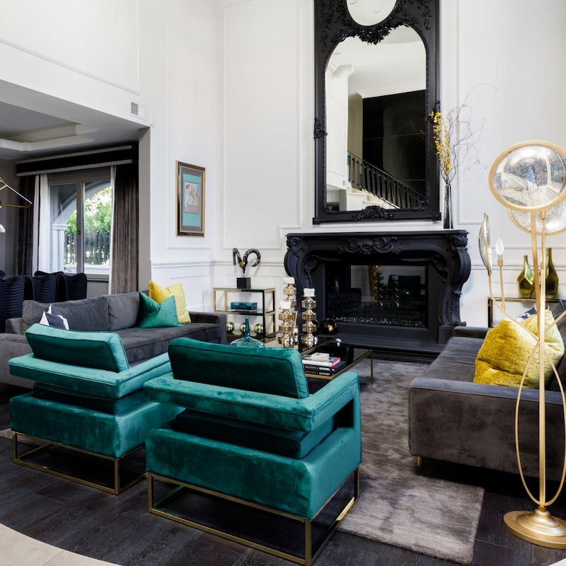 Entertain guests in the grand lounge around the feature fireplace