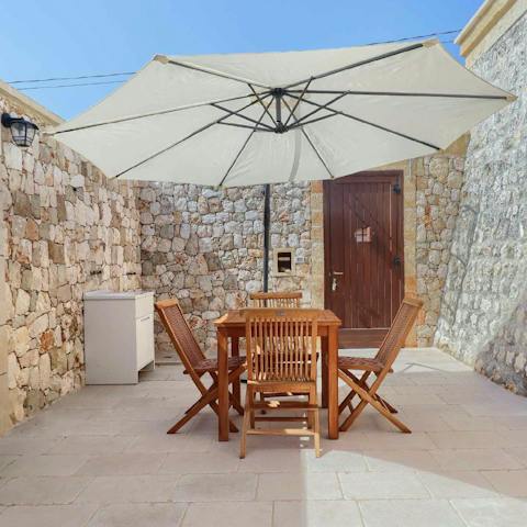 Dine alfresco in the open-air courtyard