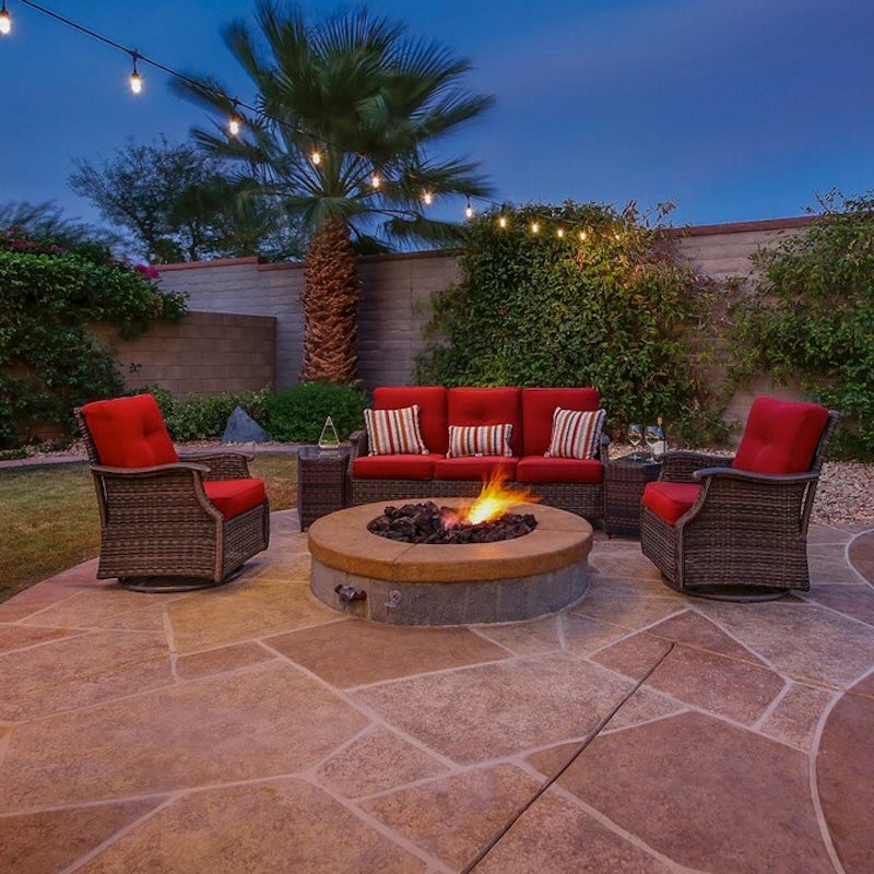 Spend a chilled evening around the firepit table - one of three outdoor seating areas
