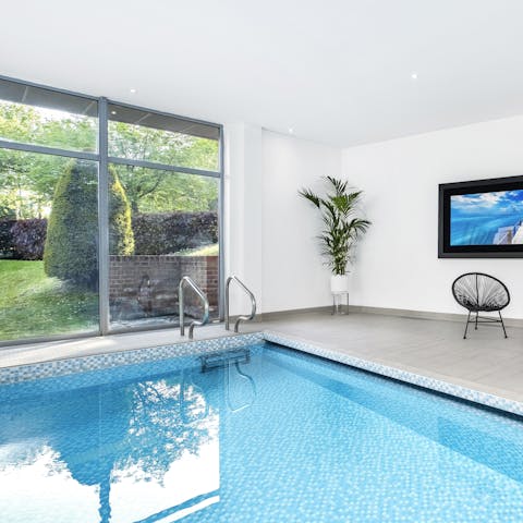 Splash about in the indoor heated swimming pool