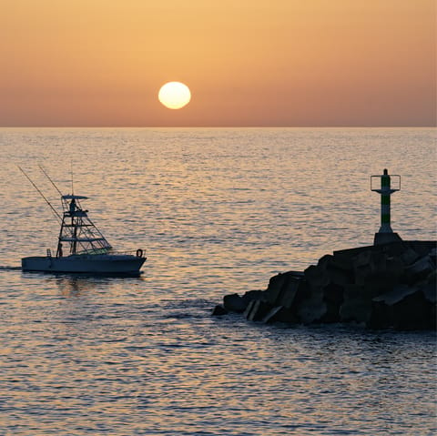 Make the 3km drive over to the Calheta coastline and paddle in the ocean