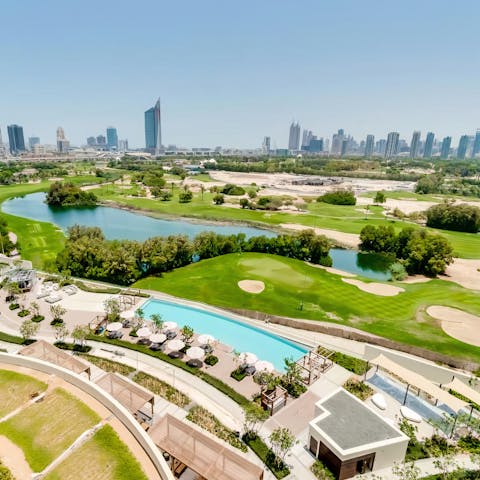 Gaze out at Emirates Golf Club through the window and book in a game on the pristine course