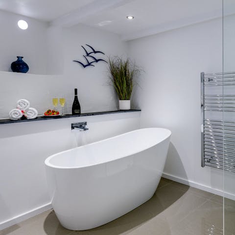 Treat yourself to a long soak in the freestanding bathtub