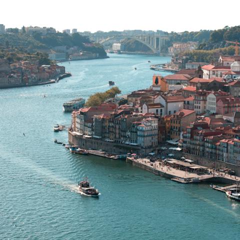 Meander along the river, popping into bars to sample Port