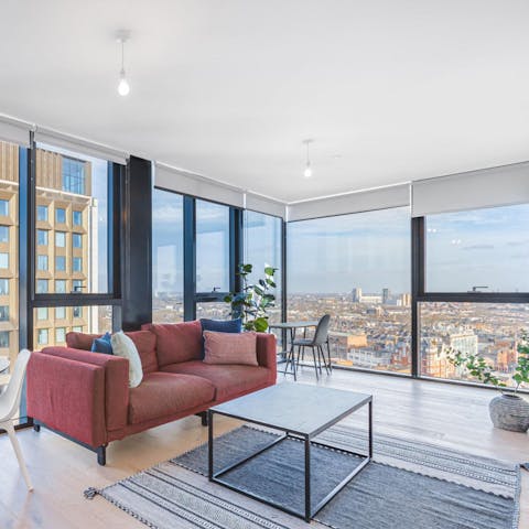 Take in far-reaching city vistas from this fifth-floor flat