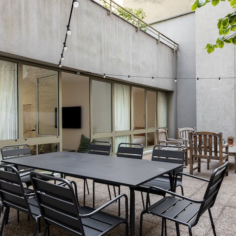 Enjoy an alfresco dinner out on one of the apartment's pair of terraces