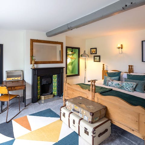 Sit at the desk to get some work done by the cosy fireplace after a good night's sleep