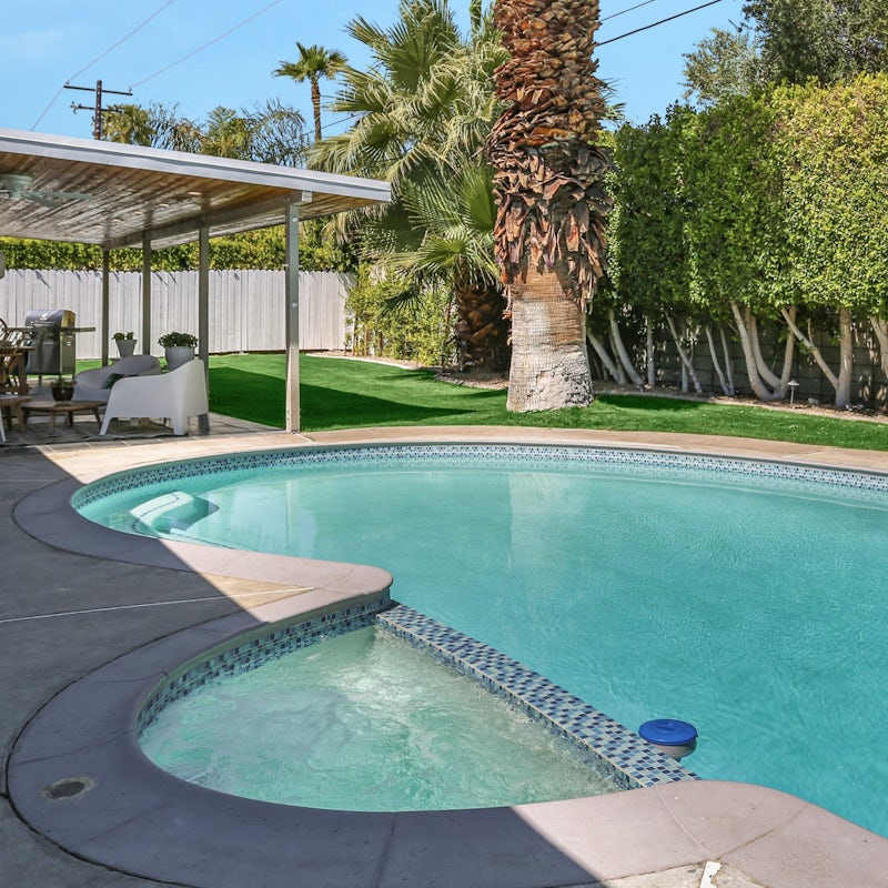 Relax with a glass of bubbly in the hot tub