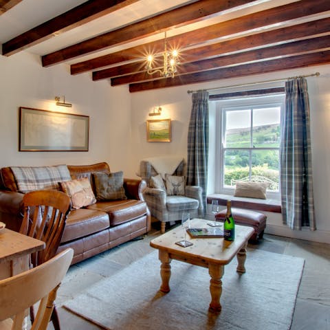 Kick back in the cosy living room in front of the wood-burning stove