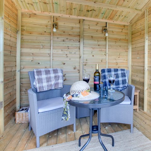 End the evenings with a glass of wine in the summerhouse, watching the stars pop out over the countryside