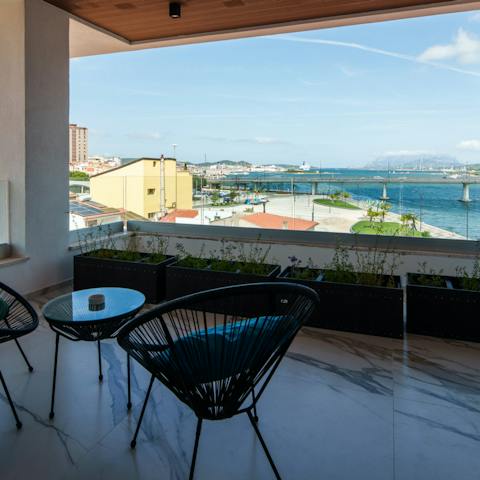 Soak up the views of Tavolara and the Gulf of Olbia from the private balcony