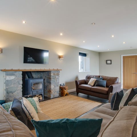 Spend cosy evenings lounging on the plush sofas, watching a film while the warming fire crackles