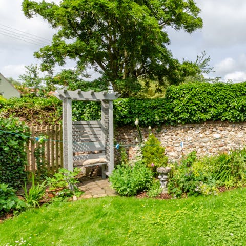 Find a sunny spot in the garden to relax with a good book