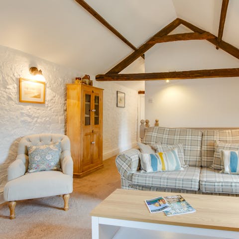 Get comfy with a cup of tea or glass of wine  in the cosy living space 