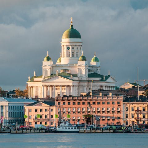 Visit Helsinki's majestic cathedral with its historical architecture and statues
