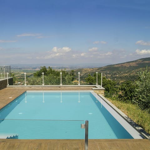 Take in the incredible Val di Chiana views from the private pool