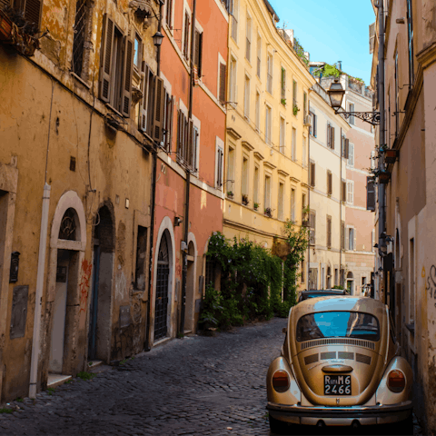 Stroll along the quaint alleyways to the centre of Trastevere