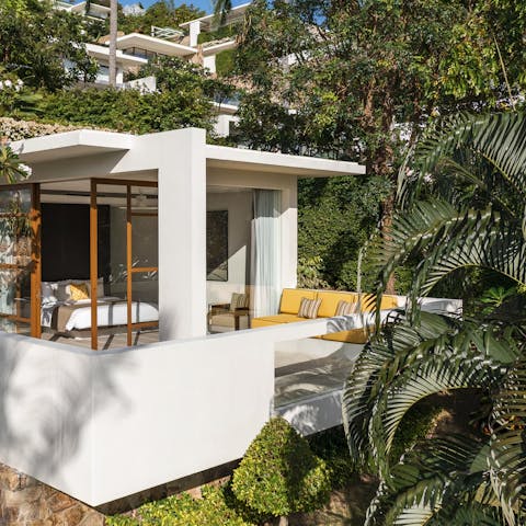 Step out of your bedroom and into a paradise of lush green foliage and natural views