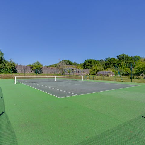 Serve an ace on the private tennis court