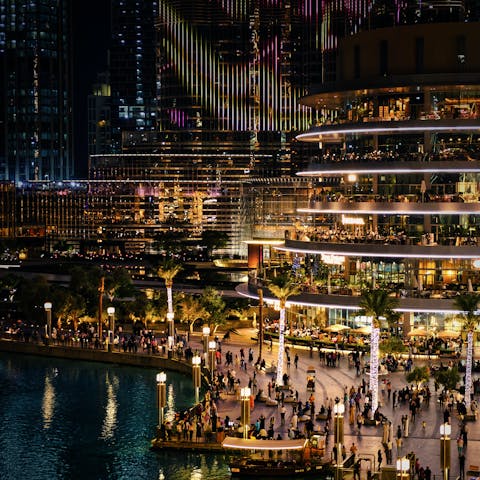 Experience the Dubai Mall at night, a short taxi ride away