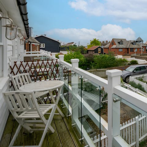 Glimpse the sea from the private balcony as you enjoy a morning coffee