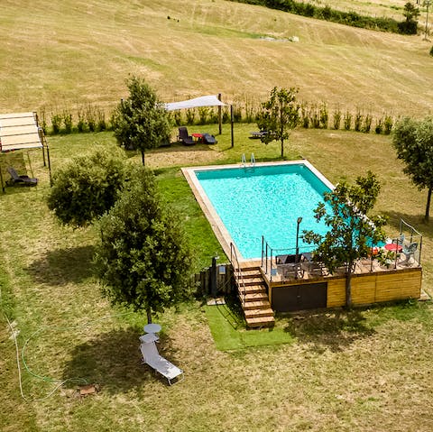 Stroll across the lawns to the shared outdoor pool