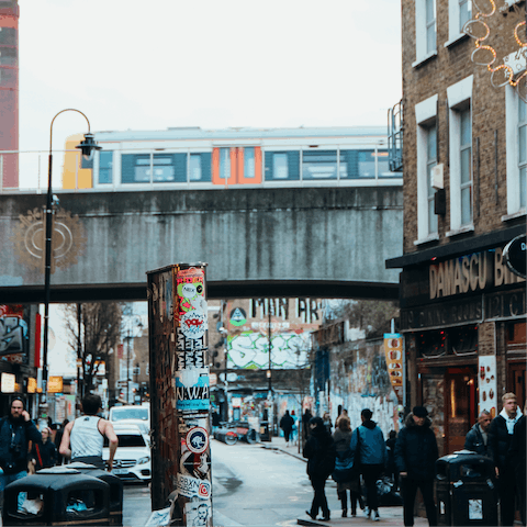 Explore trendy Shoreditch High Street – eight minutes walk away