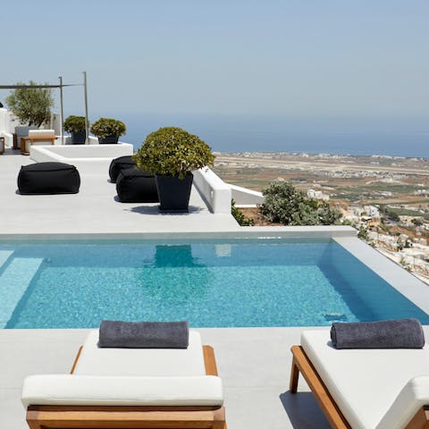 Stretch out poolside to absorb the southern Aegean rays