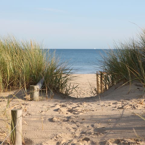 Drive fifteen minutes to visit the gorgeous Porth Neigwl beach