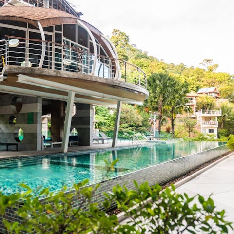 Swim a few lengths in the pool surrounded by lush greenery