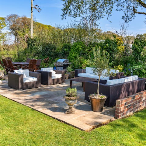 Grab a glass of wine or a cup of coffee and get comfy on the patio