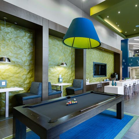 Play a game of billiards or shuffleboard in the communal lounge
